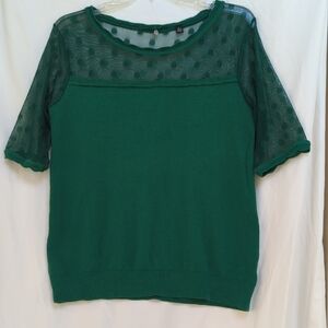 Green short sleeved sweater with sheer polka dot detail